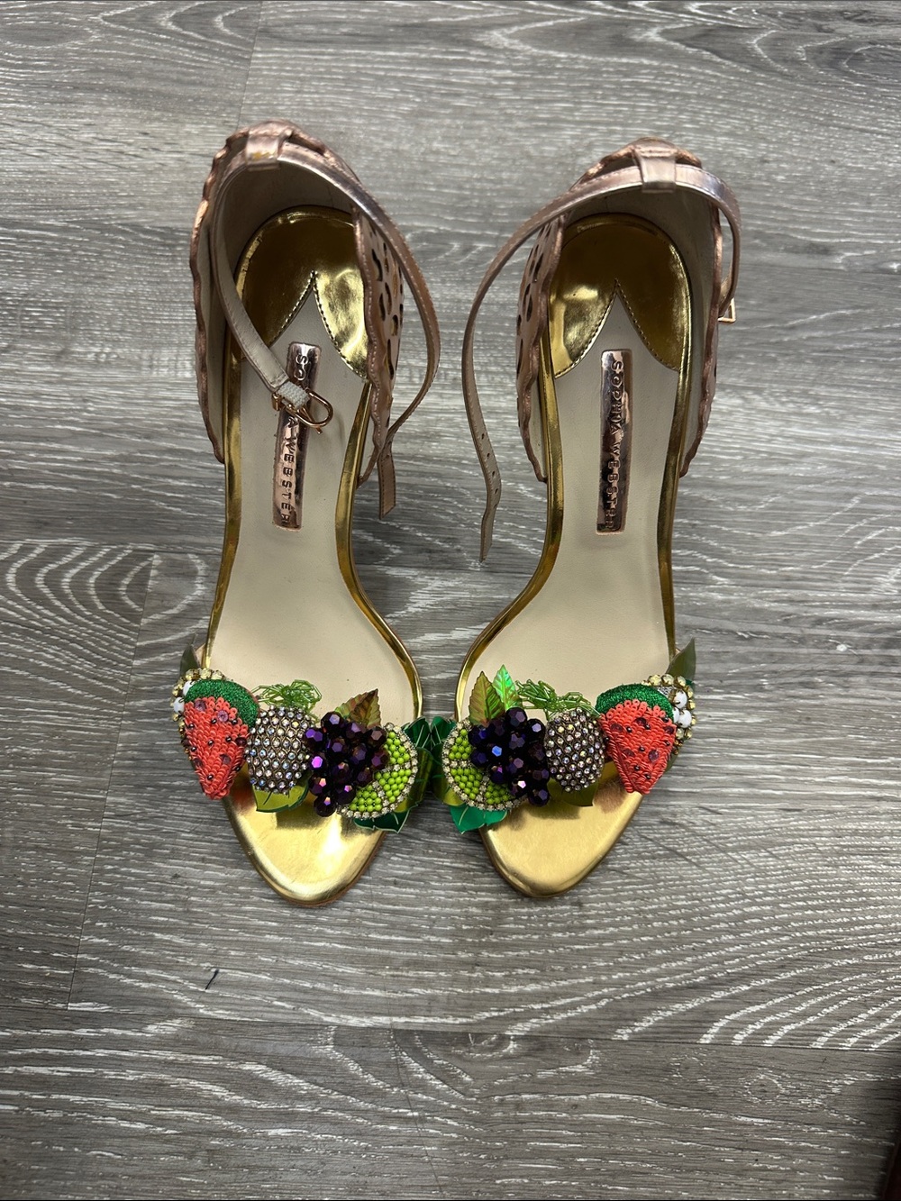 Embellished Gold Ankle-Strap Sandals with Fruit Appliqué